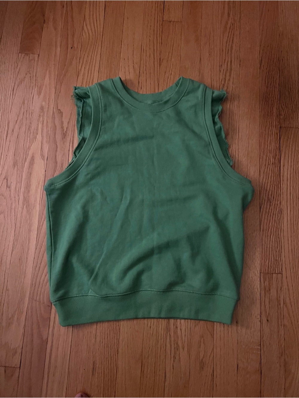 NWT Free People Movement Green Sleeveless Ribbed Tank with Ruffled Detailing.